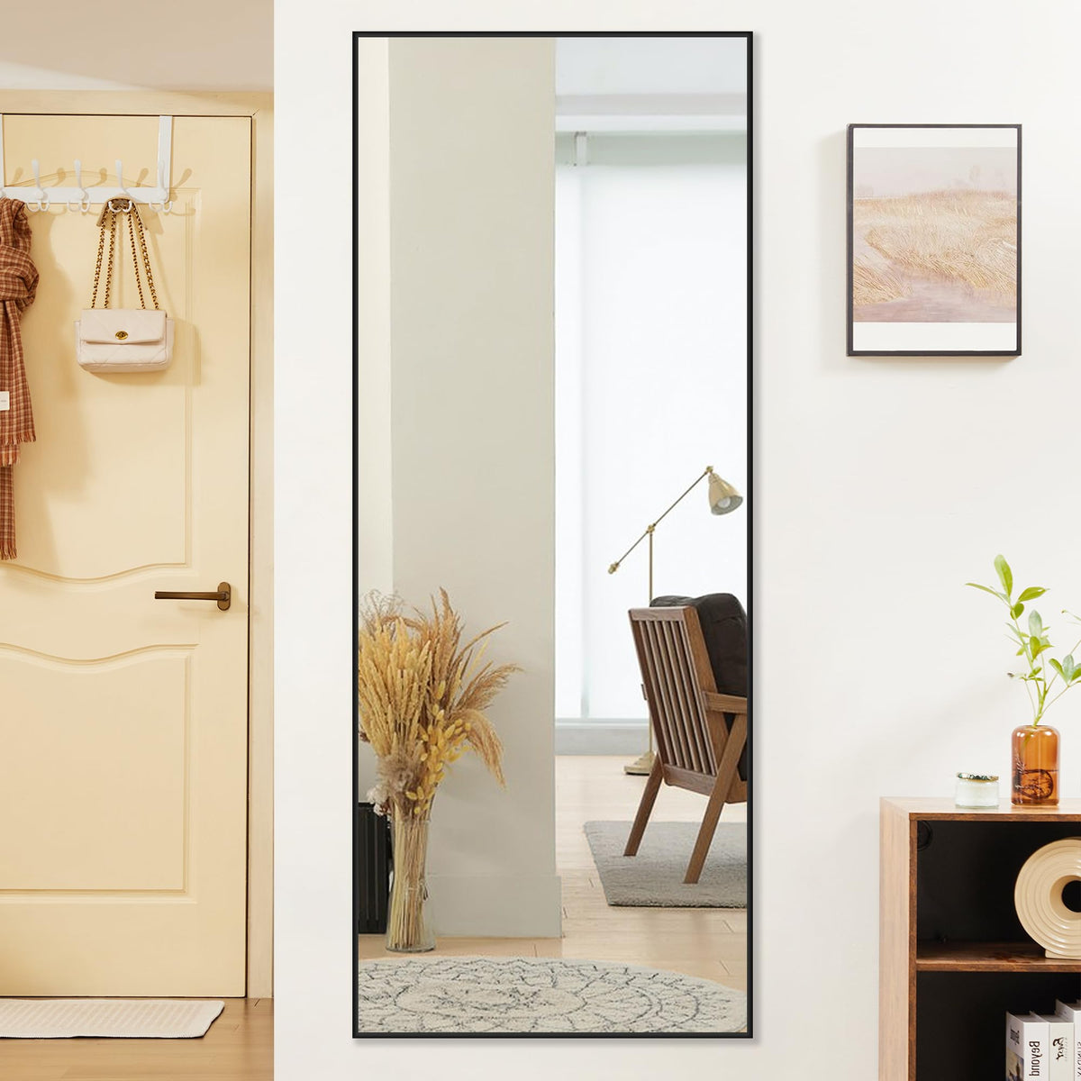 DUMOS full-length mirror leaning against wall offers flexible placement and space efficiency.