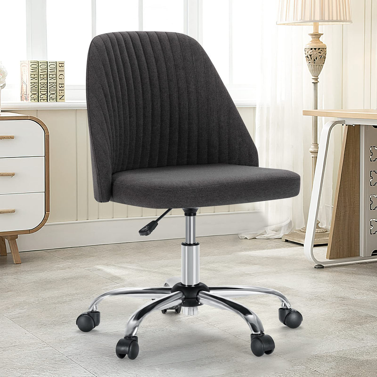 DUMOS office chair in gunmetal gray with a swivel base for smooth, effortless movement.