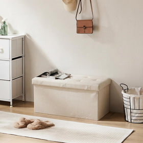 DUMOS storage ottoman beige end-of-bed bench provides extra seating.