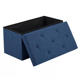 DUMOS storage ottoman with blue padded seat for comfortable seating and hidden storage.