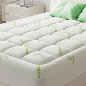 DUMOS twin-size topper fabric closeup shows soft bamboo viscose for cooling comfort