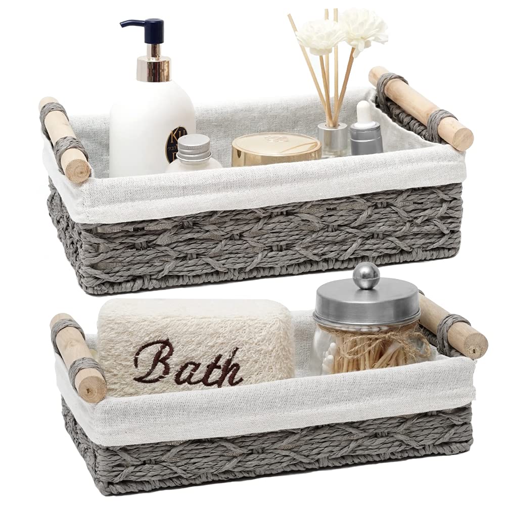 DUOER wicker storage basket on toilet tank top for bathroom essentials and organization.