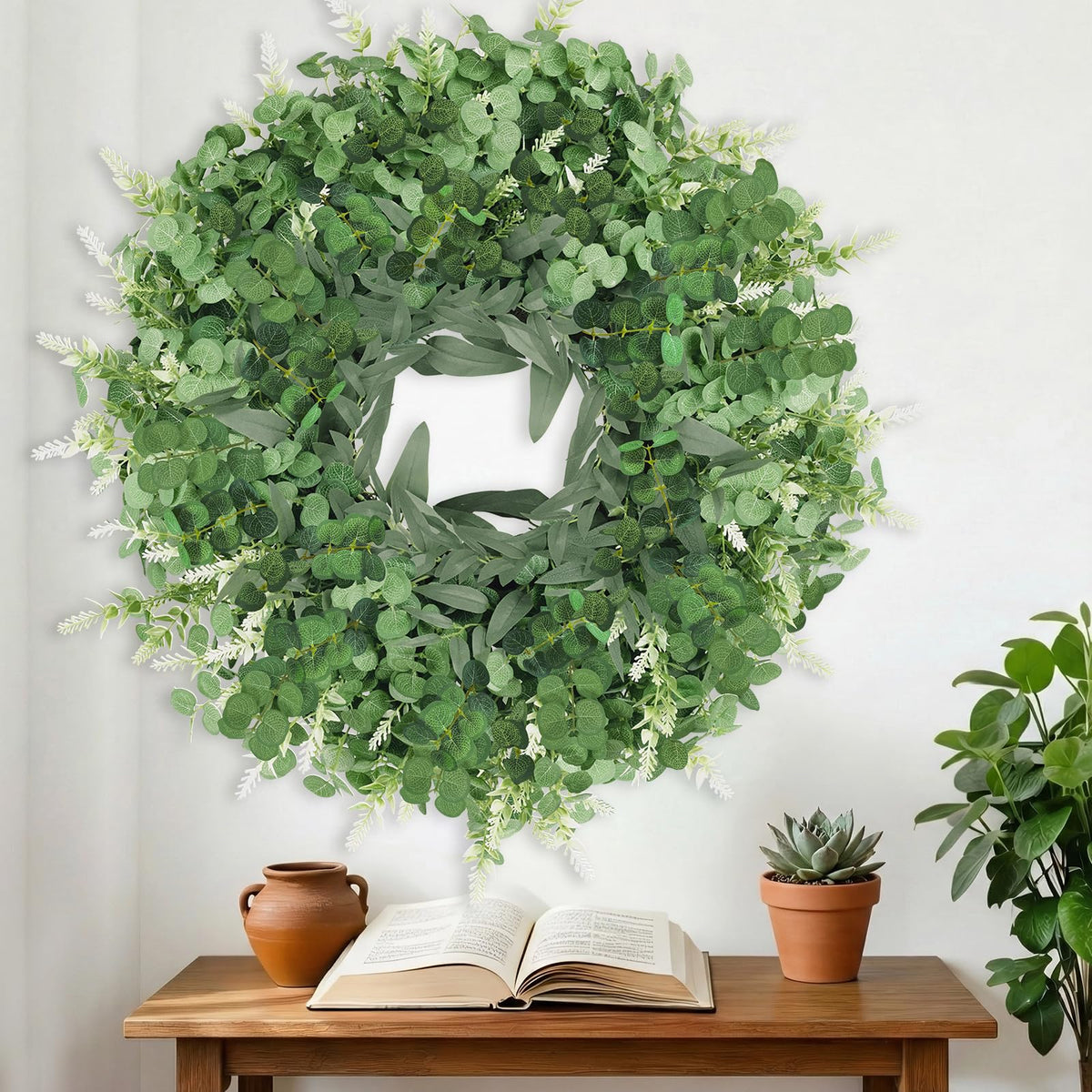 Dushle eucalyptus wreath provides a lush focal point for events