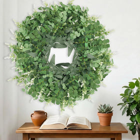 Dushle eucalyptus wreath provides a lush focal point for events