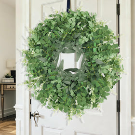 Dushle wreath features white blooms for elegant seasonal updates