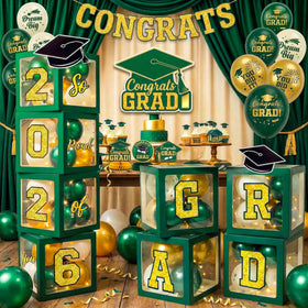 Duwagtry graduation boxes create a bold backdrop for Class of 2026 photos.