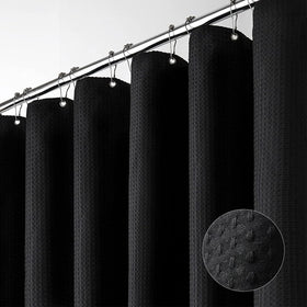 Dynamene 60x72 black waffle curtain with honeycomb texture adds modern bathroom style.