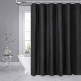Dynamene Long Black waffle curtain in hotel-style bathroom.