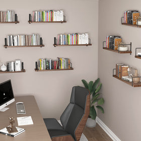 EALLRINEC shelves in a living space used with plants and decor.