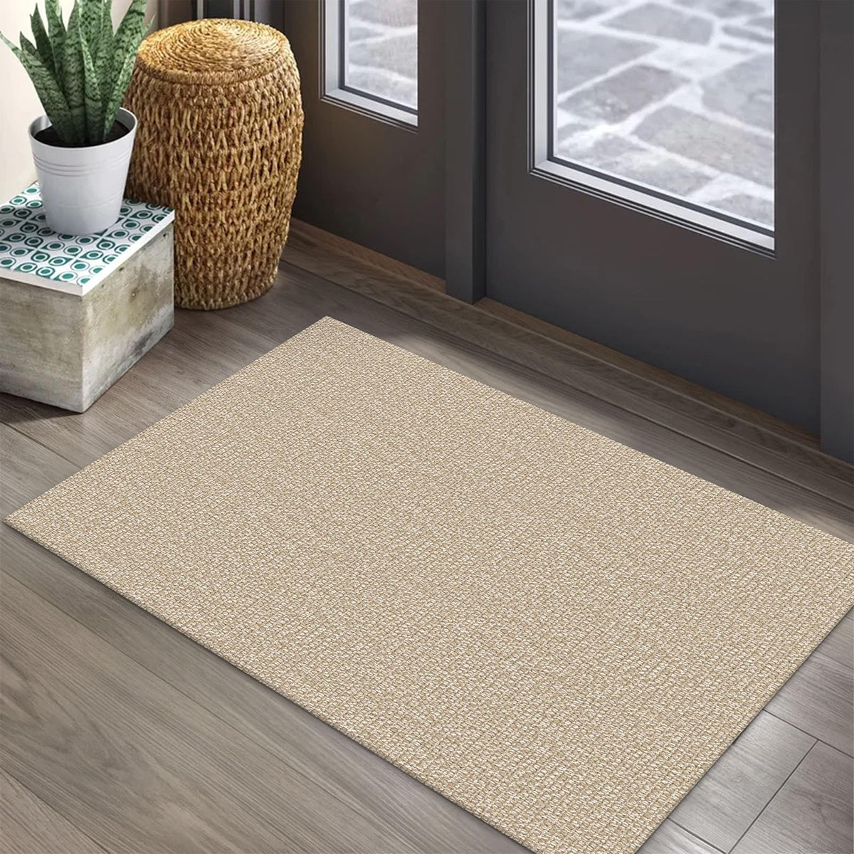 EARTHALL 2x3 sand beige rug for front door enhances entryway with warm neutral tones.
