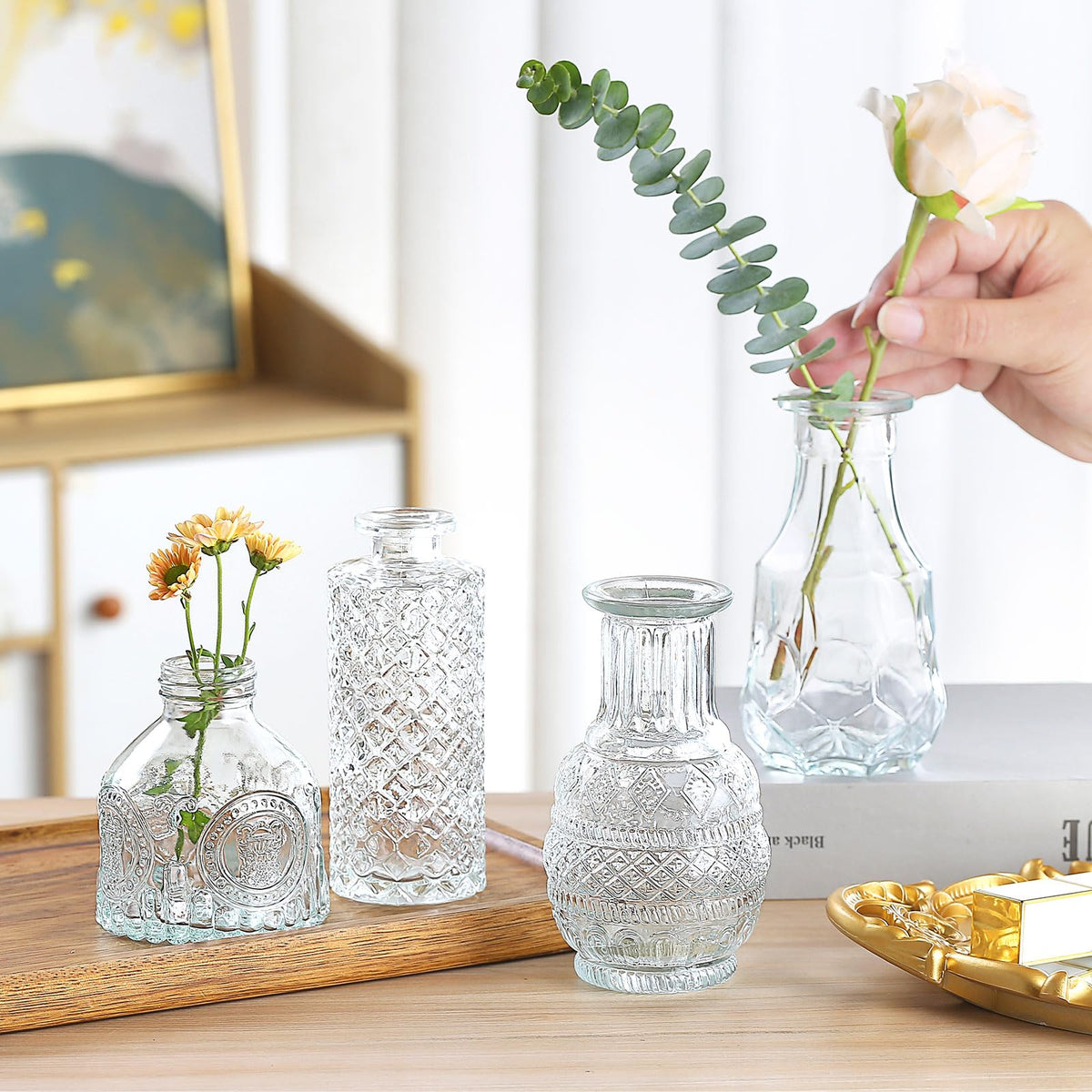 EarthGadgets bud vase with etched patterns refracting light elegantly