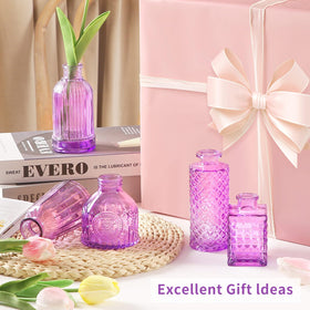 Earthgadgets etched-pattern purple bud vase adds vintage charm.
