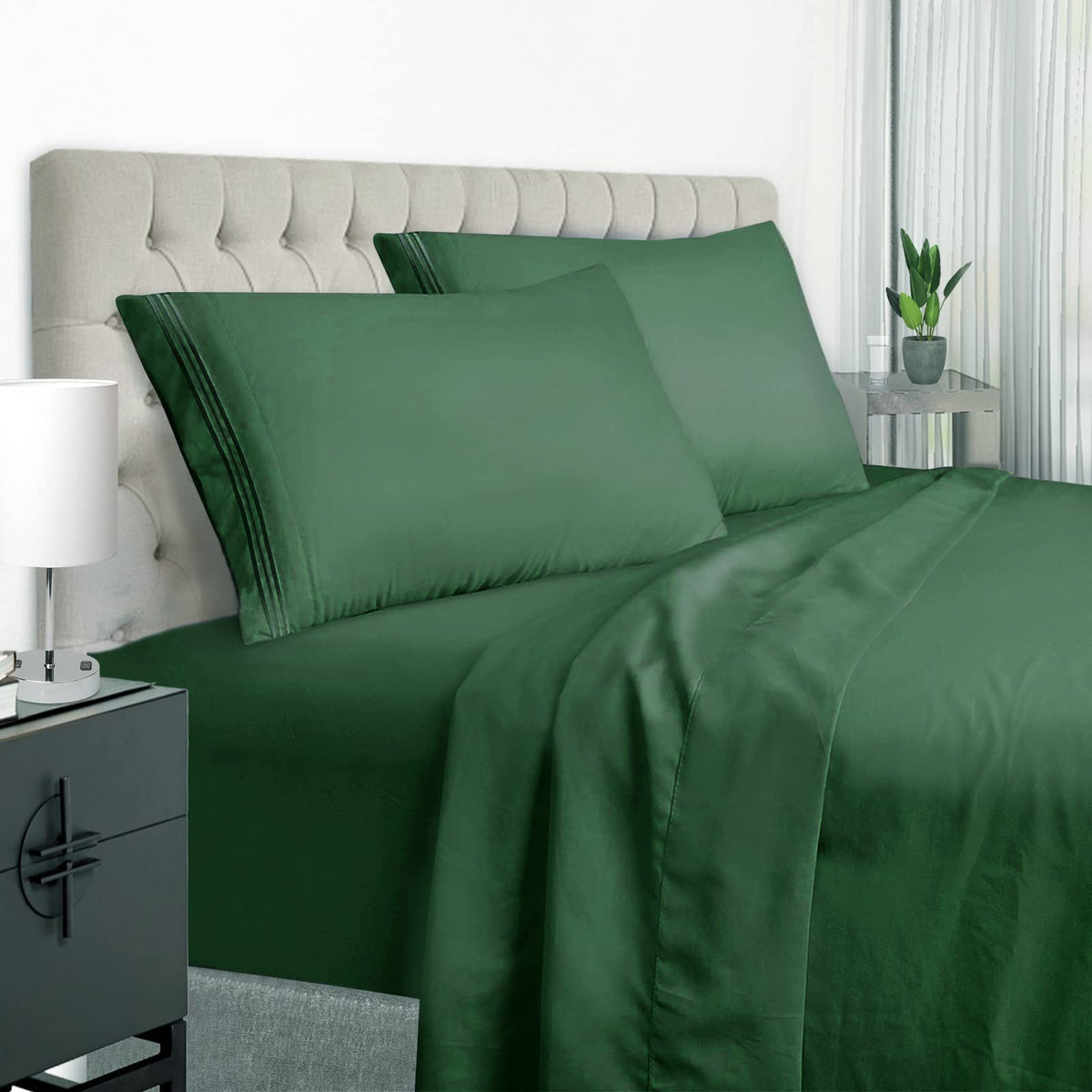 EaseHome dark green flat sheet sits smoothly on a bed with soft, breathable microfiber.