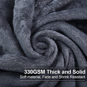 EASELAND all-season blanket on bed and couch showing lightweight warmth.