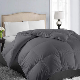 EASELAND queen-size down-alternative comforter on bed for cozy all-season warmth
