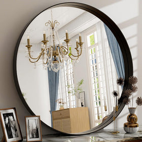 Easly 24-inch round mirror with black frame, front view showing modern circular design and reflection.