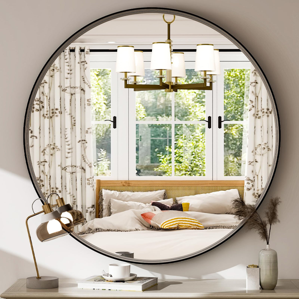 Easly round mirror with black aluminum frame mounted on wall in contemporary bathroom.