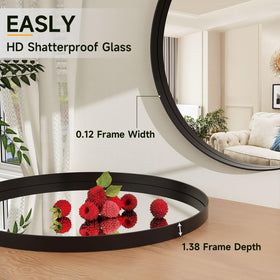 Easly 24-inch round mirror above a bedroom console for elegant decor.