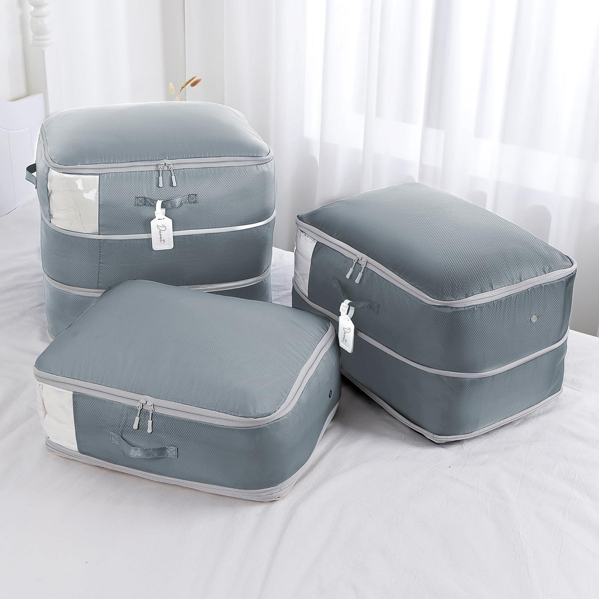 Two-pack set keeps spare bags for seasonal items.