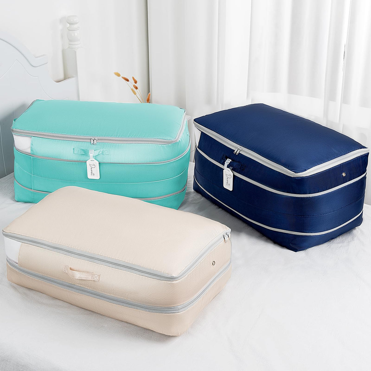 Easortm Comforter Storage Bag holds 3-4 queen comforters uncompressed for bulk storage.