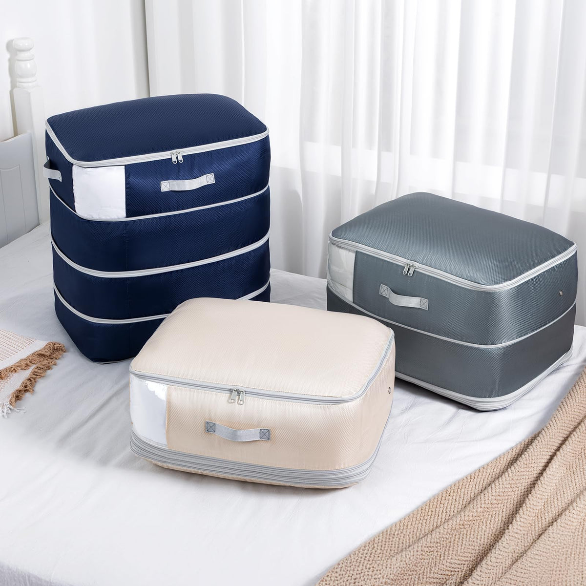 Easortm 130L capacity holds multiple queen comforters when uncompressed.