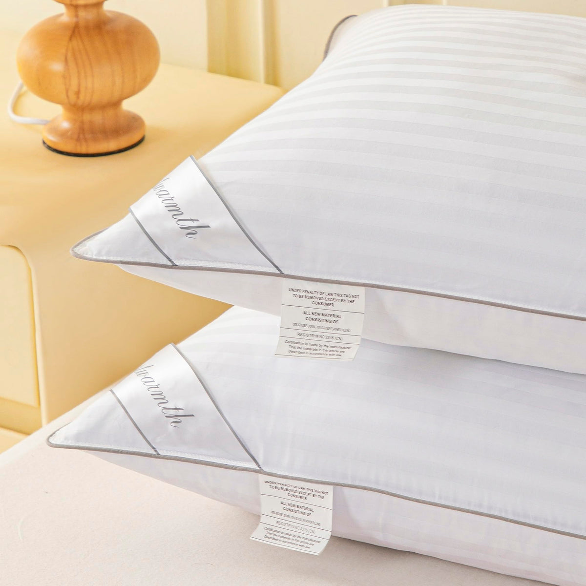 Eastwarmth double-stitched edges prevent feather leakage and maintain shape.