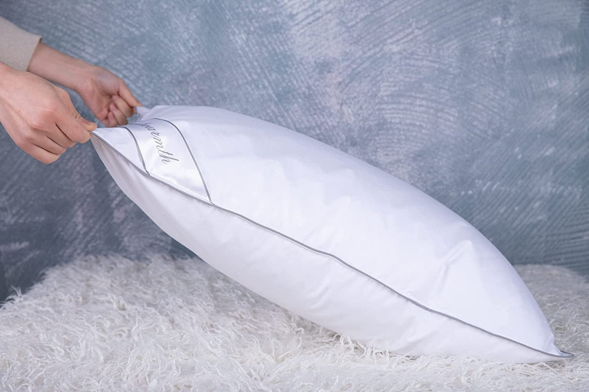 Eastwarmth goose-down cooling pillow care instructions suggest cold washing and air drying.