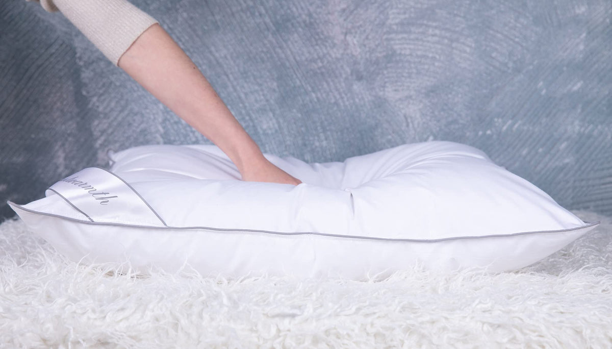 Eastwarmth goose-down cooling pillow detail fill reveals the 30/70 down-to-feather blend.