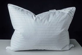 Eastwarmth pillow cover close-up highlights breathable cotton stripe for quiet, comfortable sleep.