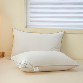 Eastwarmth pillow grey piping detail showing durable self-piping for feather retention.