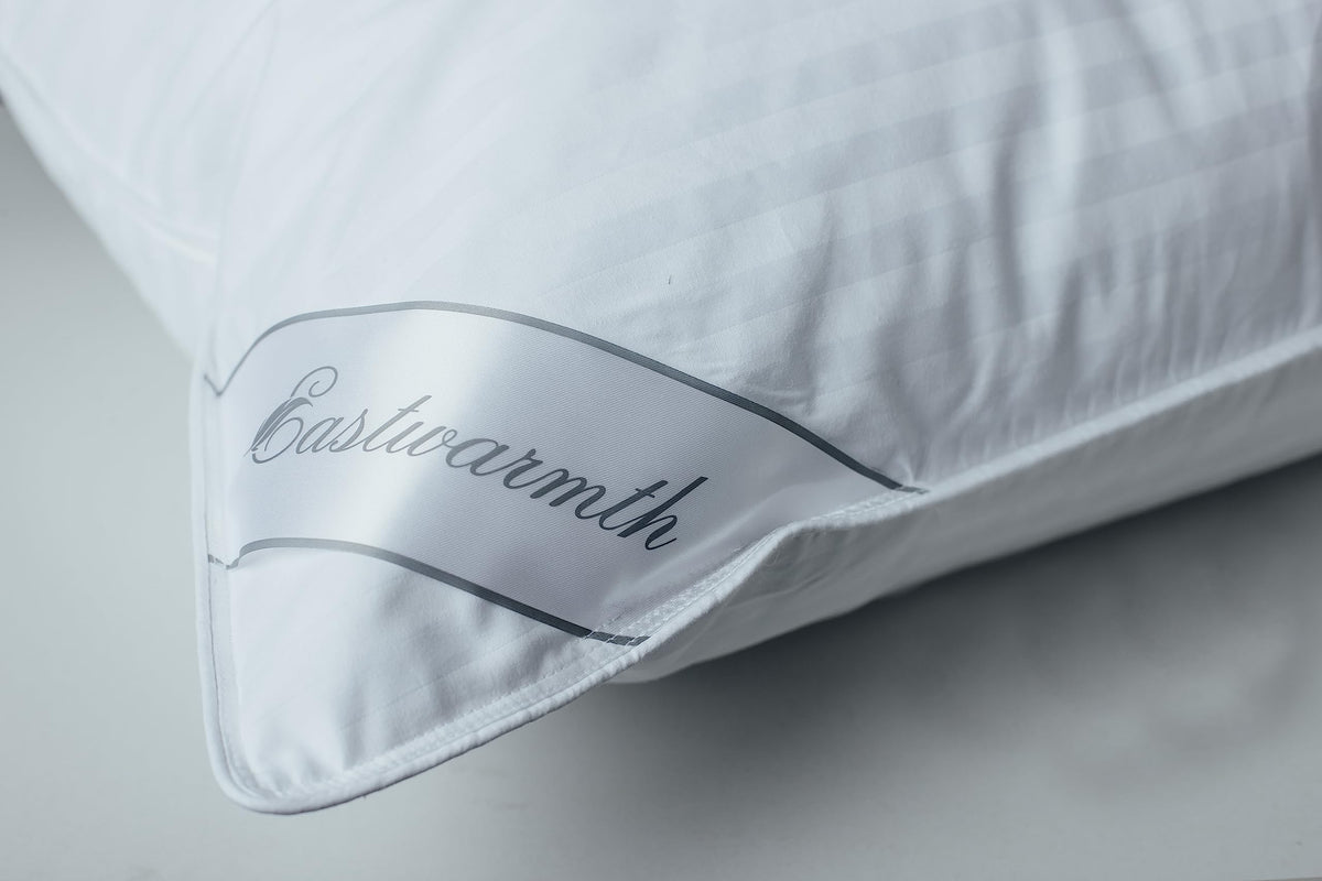 Eastwarmth pillow side view highlights ergonomic neck support.