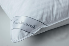 Eastwarmth pillow side view highlights ergonomic neck support.