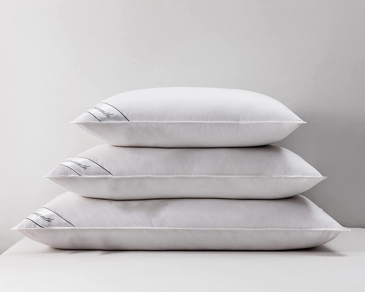 Eastwarmth lifestyle scene with pillow in bed emphasizes cool, comfortable sleep.