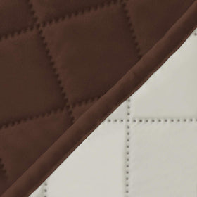 Easy-Going reversible couch cover detailed stitching highlights the quilted texture.