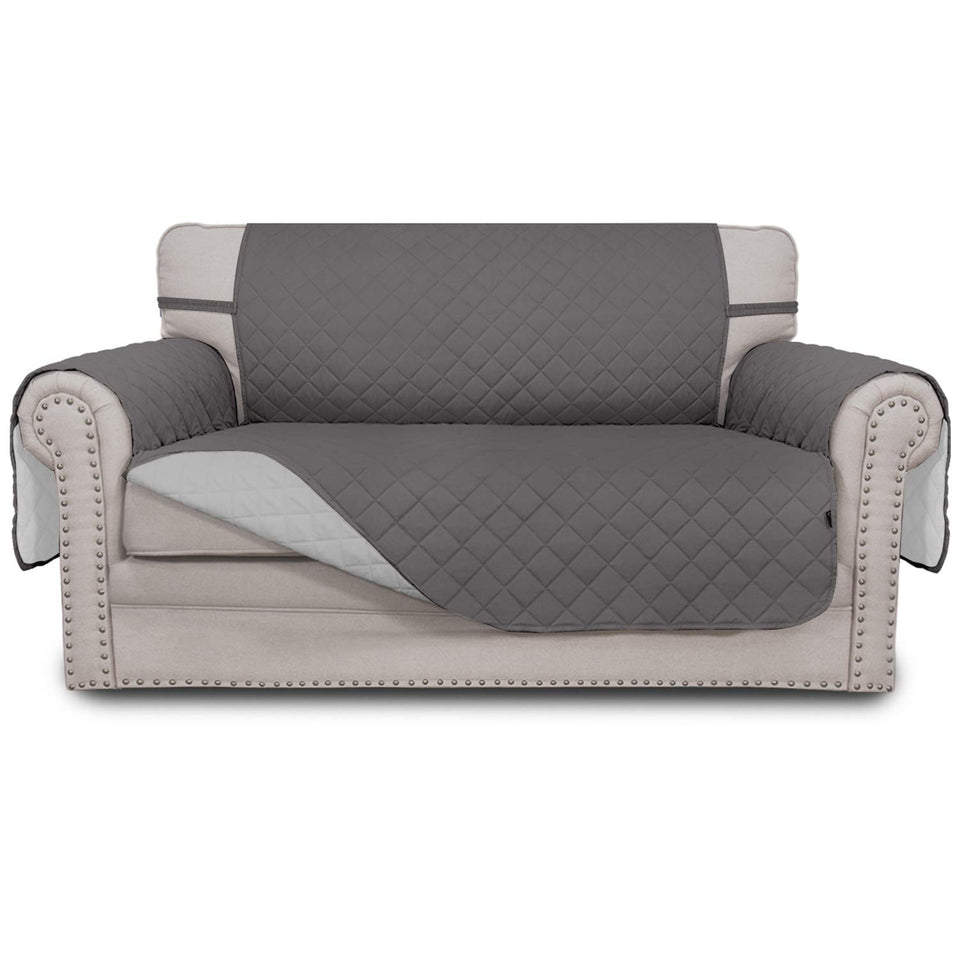 Easy-Going reversible loveseat cover in gray protects your sofa with a soft quilted texture.