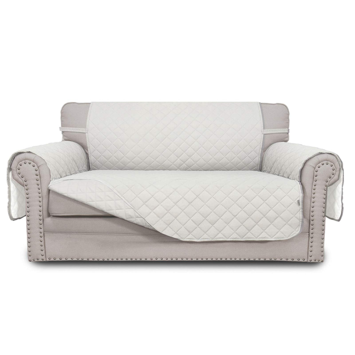 Easy-Going reversible loveseat cover on sofa; protects against daily wear.