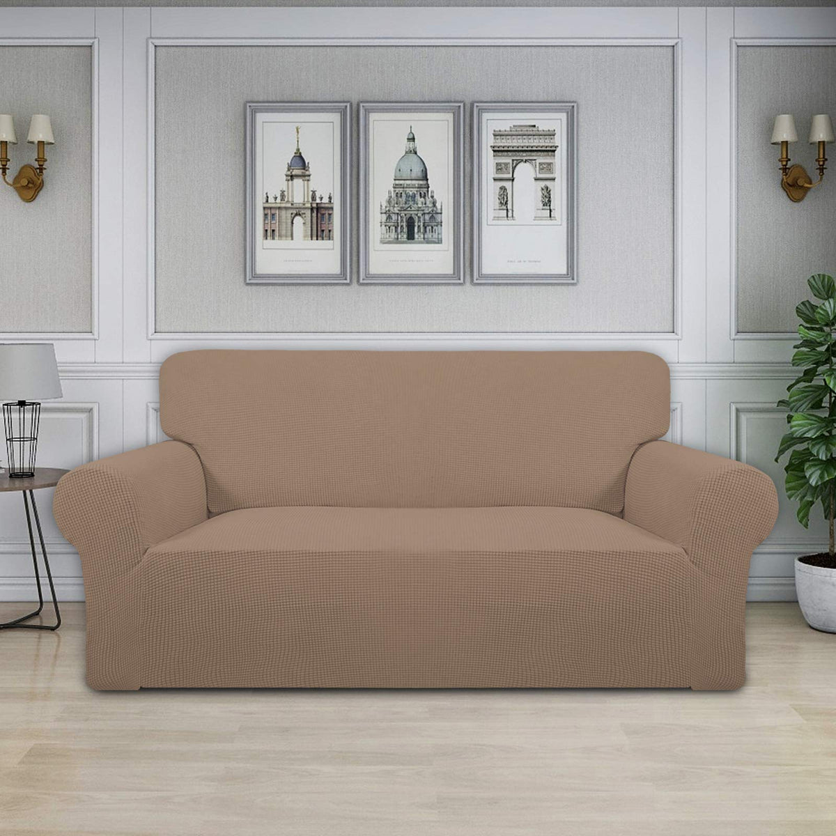 Slipcover on loveseat setup shows elastic bottom for secure placement during daily use.
