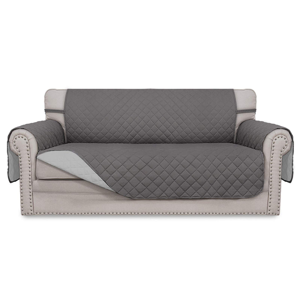Easy-Going sofa slipcover in gray shows reversible design for adaptable decor
