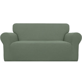 Easy-Going stretch loveseat slipcover with elastic bottom showing a secure fit on a sofa
