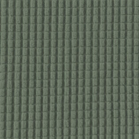Slipcover protecting a loveseat from daily wear and minor spills