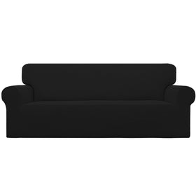 Easy-Going stretch slipcover being installed on an oversized sofa for quick protection.