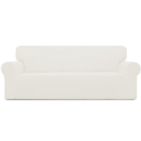 Easy-Going cream stretch slipcover on an oversized sofa enhances protection and comfort.