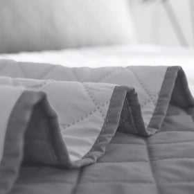 Easy-Going water-resistant microfiber fabric detail for spill protection.
