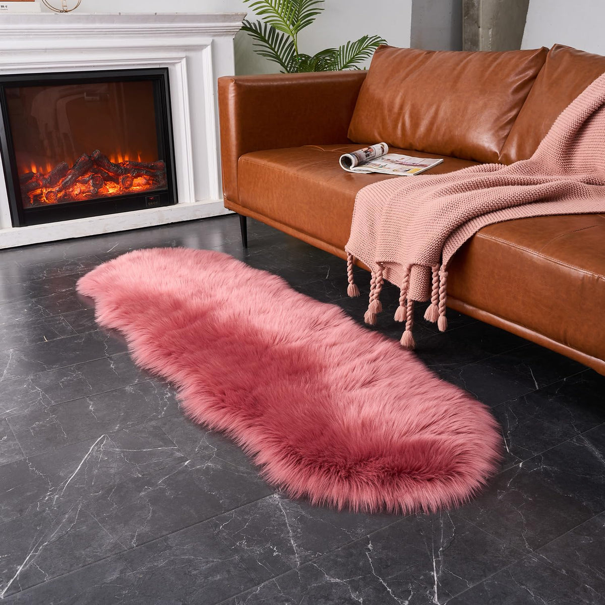 EasyJoy blush pink faux fur rug enhances bedside ambiance.