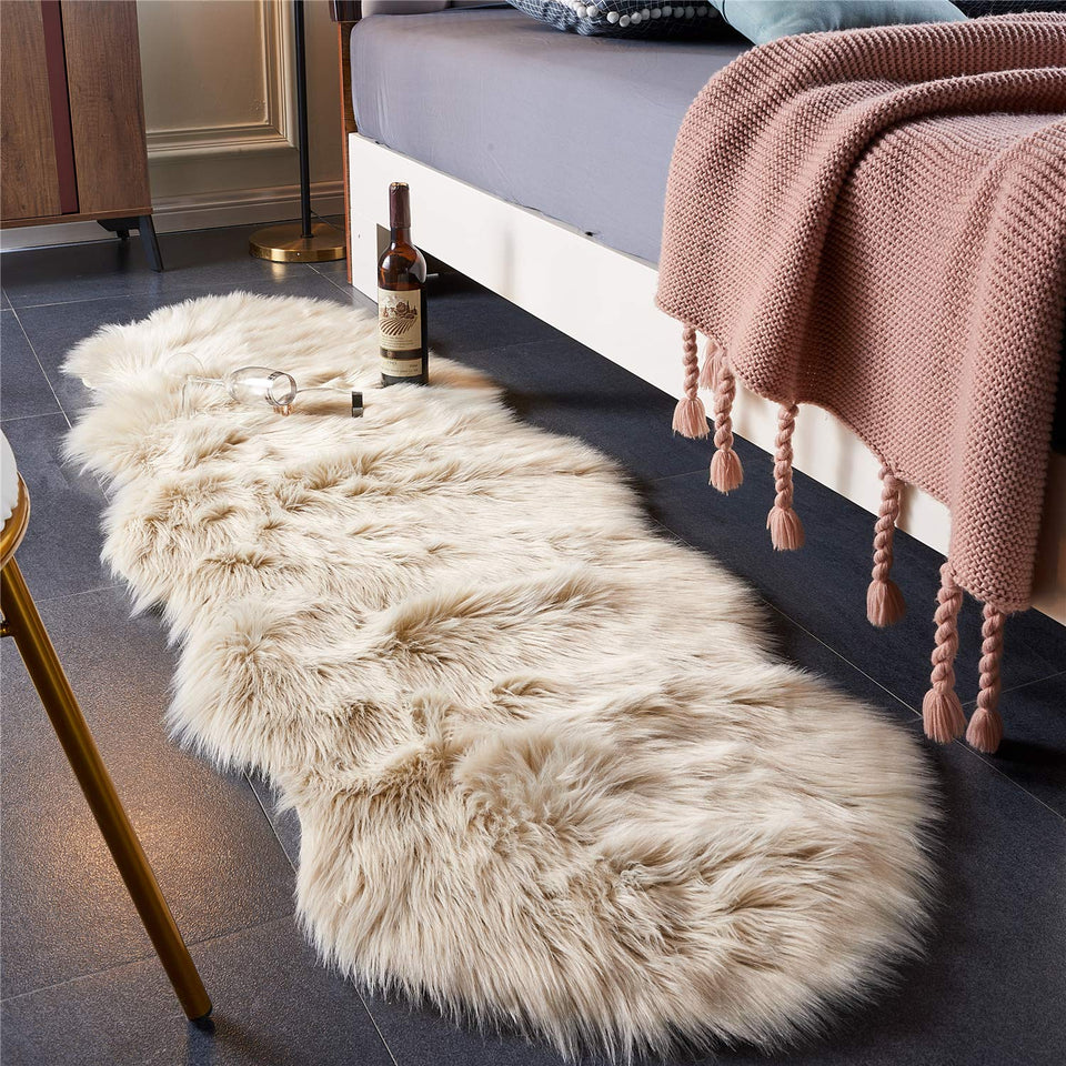 EasyJoy ultra-soft sheepskin rug in beige for cozy floor comfort.
