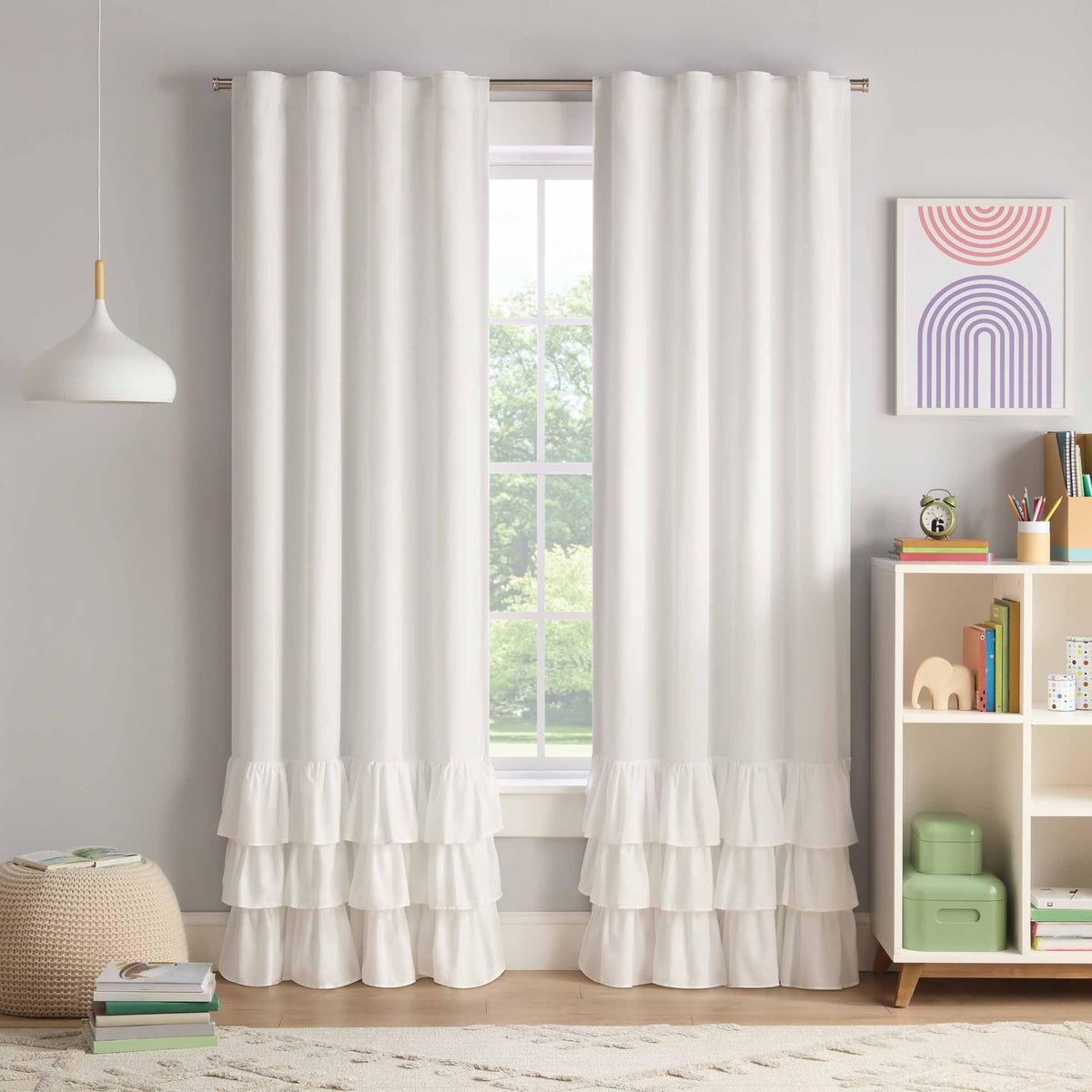 Eclipse Kids tiered ruffle blackout curtain blocks light for restful afternoons.