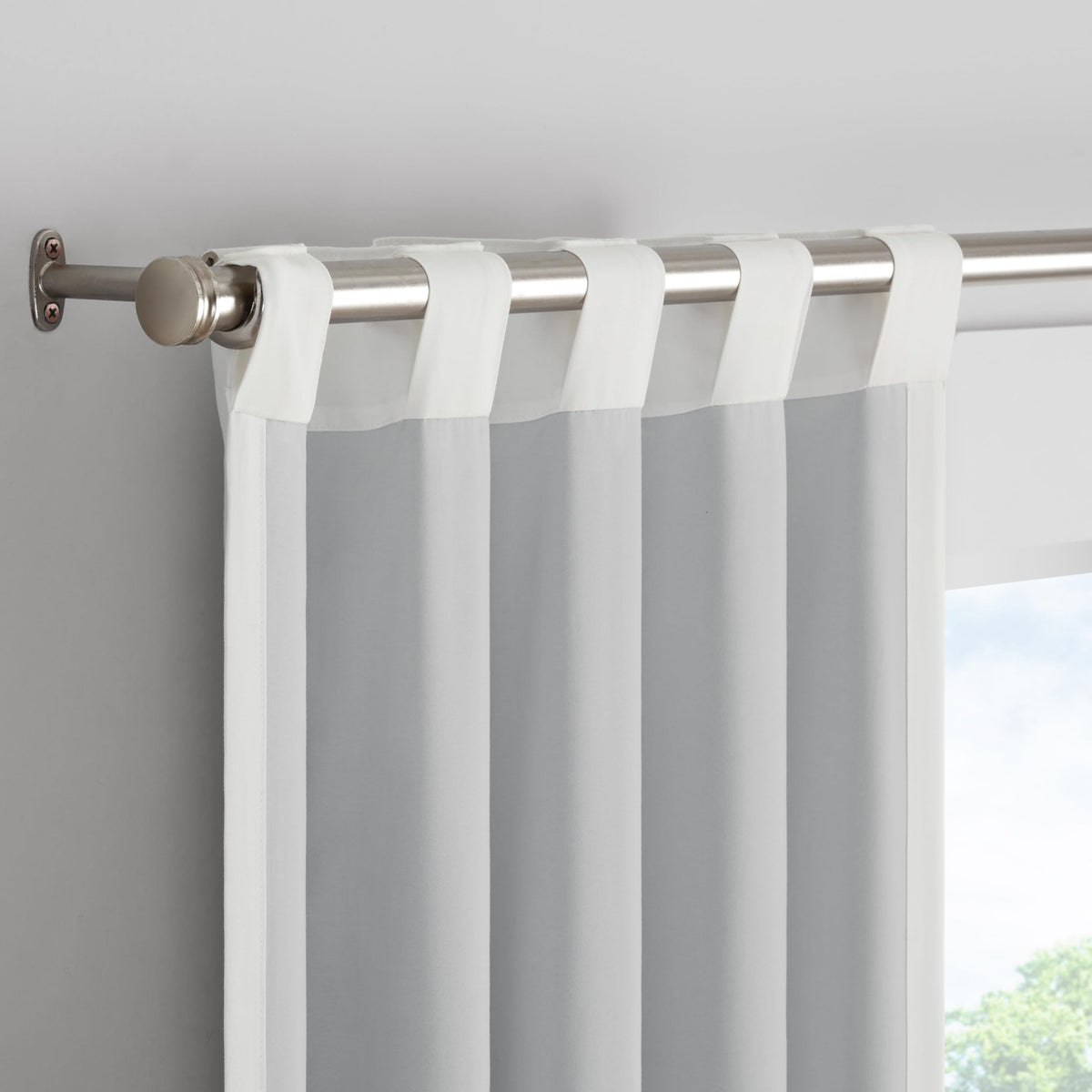 Eclipse white kids curtain adds a soft, elegant touch to a playroom.