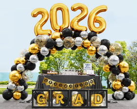 Ecomore grad letters and glitter stickers spell a proud message for photos.