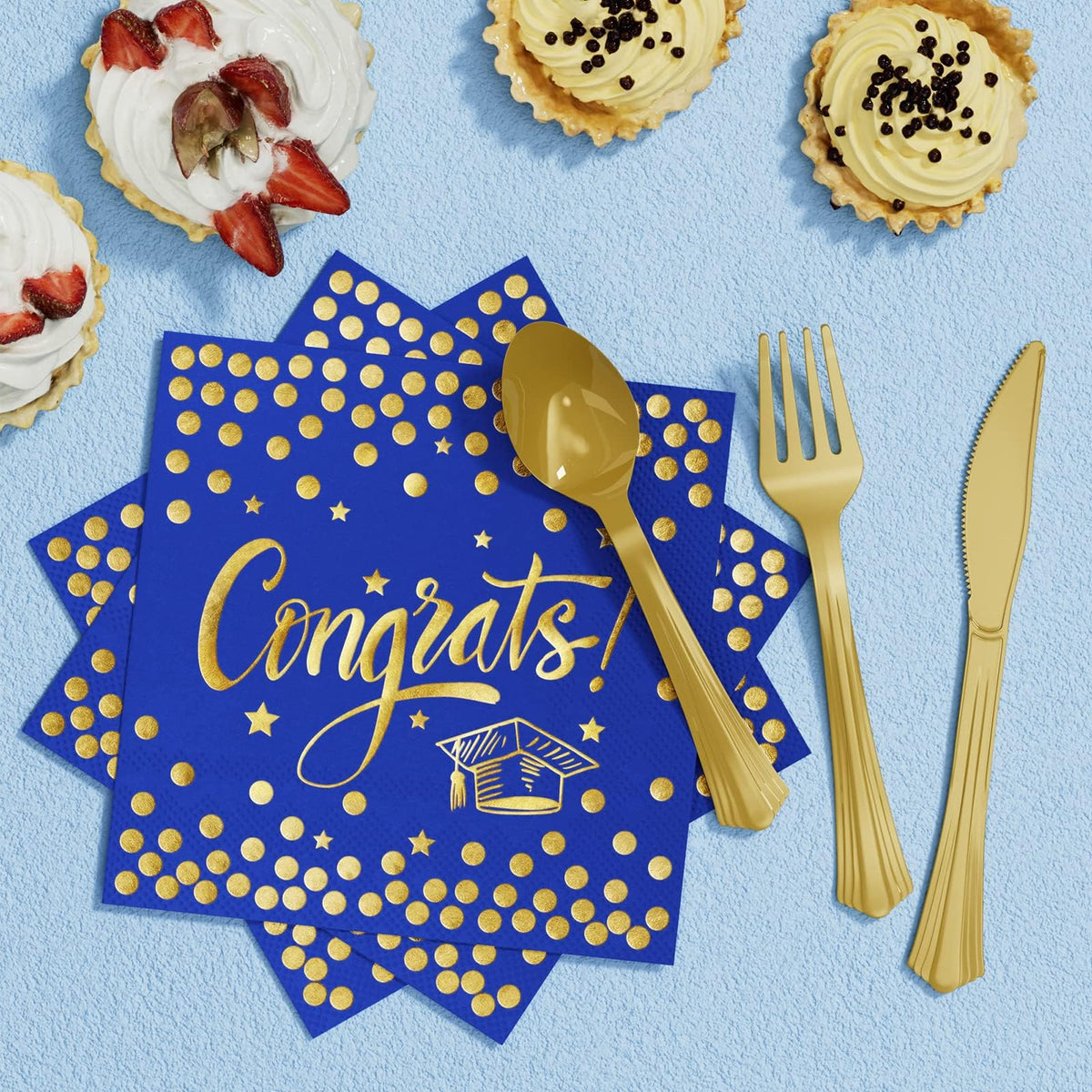 Ecomore blue gold graduation tablecloth adds a polished backdrop.