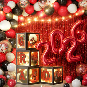 Ecomore graduation boxes with letters and LED strings create a striking centerpiece for 2026.